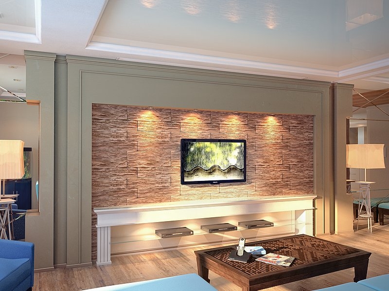 Гостиная с нишей для телевизора облицованной декоративным камнем - Дизайн интерьера квартиры г. Салехард ул. Свердлова